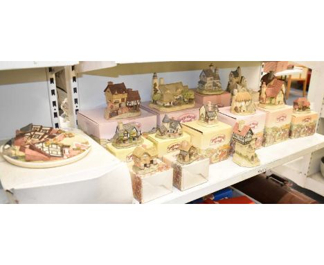 DAVID WINTER; a group of fourteen ceramic models of cottages, including 'Knight Castle', 'Staffordshire Vicarage", 'The Boat 