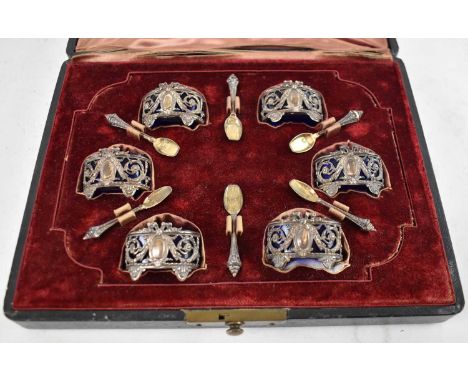 A cased set of late 19th century French silver miniature salts with spoons, the case marked for Leblanc, Nantes, each salt me