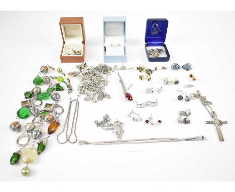 A quantity of silver and costume jewellery to include bracelets, beads, rings and necklaces.