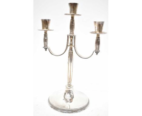 ADIE BROS; an Elizabeth II hallmarked silver three branch candelabrum, Birmingham 1957, height 29cm, approx 17.1ozt/532g.