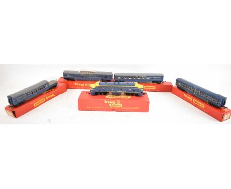 TRIANG; a double ended diesel engine and four carriages, all boxed.