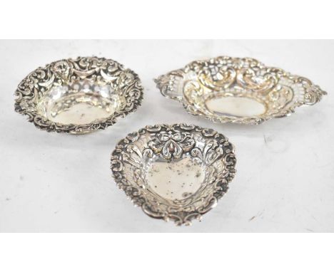 Two late Victorian hallmarked silver pierced dishes, Birmingham 1897 and another shaped oval example, combined approx. 2ozt/6