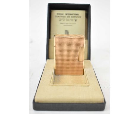 ST DUPONT; a gold plated gas lighter, in original box with paperwork.