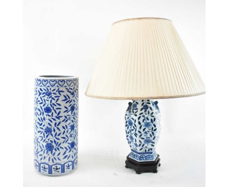 A Chinese blue and white hexagonal vase converted to table lamp, height 40cm, also a blue and white stick stand, height 42.5c