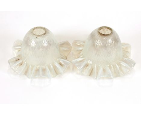A pair of vintage Vaseline glass lamp shades 