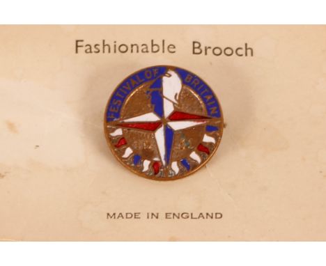 A 1951 enamel decorated Festival of Britain brooch, with original sales card