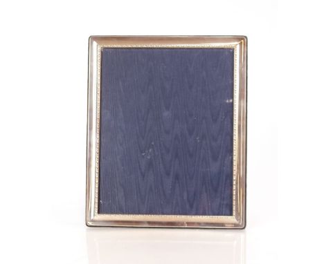 A modern silver mounted easel photograph frame, 29cm x 24cm overall