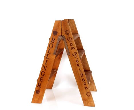 A folding wooden Champagne ladder
