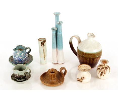 A Studio pottery chamber stick; various other Studio pottery items to include posy vases, water jug, etc.