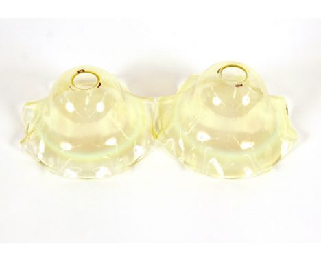 A pair of Vaseline glass lamp shades by Powell