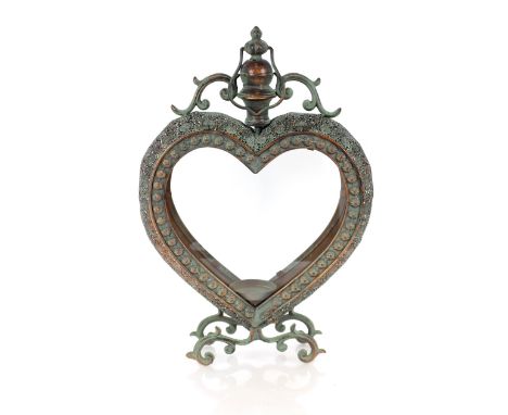 A copper heart shaped lantern 