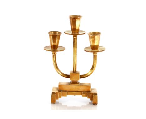 A brass three light candelabra 