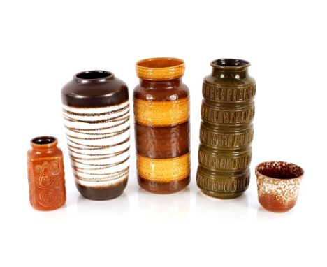 A collection of west German Pottery items including three tall vases, a  smaller example, and a planter