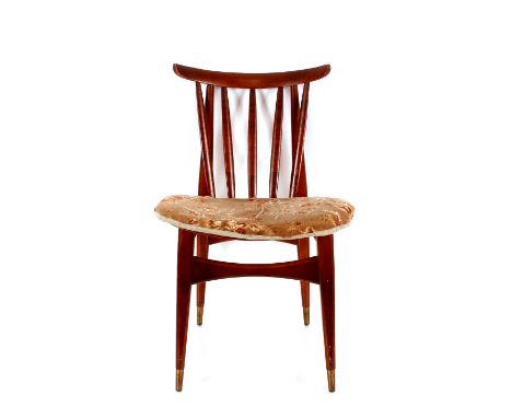 A set of four teak stick back dining chairs 