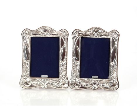 A pair of silver Art Nouveau design silver photograph frames 