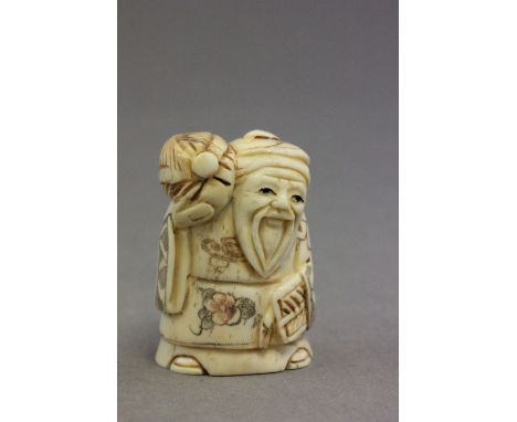 Signed oxbone netsuke of an old man with fan & basket