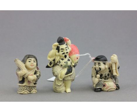 Three netsuke style figures including fisherman x 2 and girl with umbrella
