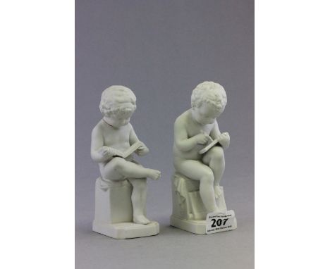 A pair of ceramic cherubs
