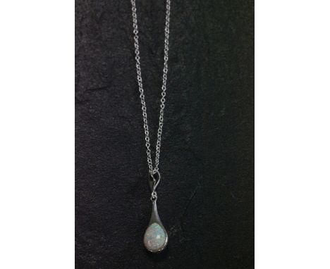 Silver and opal pendant necklace on silver chain