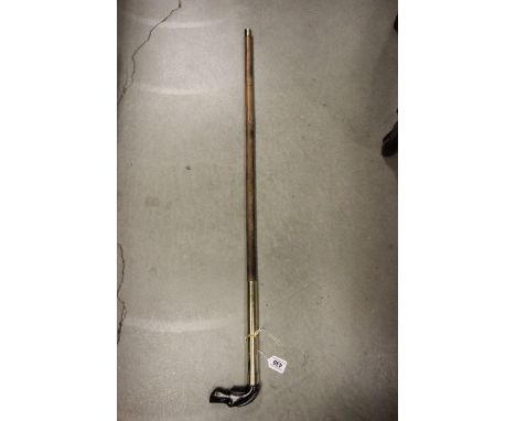 Walking stick with dogs head handle