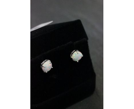 Pair of silver and opal ear studs