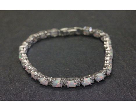 Silver CZ and opal line bracelet