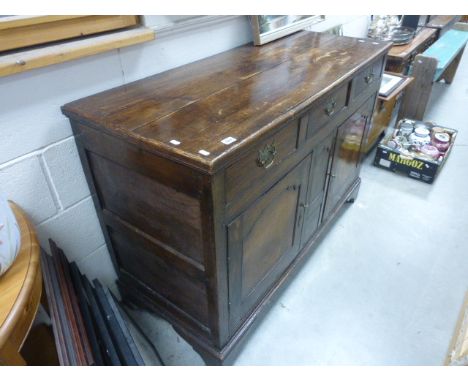 19th century Panelled Oak sideboard with three drawers over three cupboards on bracket feet