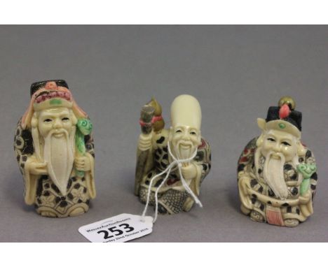 Three netsuke style figures of old men