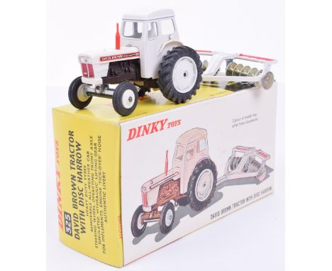Dinky 325 David Brown tractor with Disc Harrow, white body, brown engine with ‘DAVID BROWN SELECTAMATIC 990’ stickers, red ex