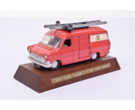 Dinky 286 Ford Transit Fire Appliance Salesmen’s Sample mounted on factory made wooden plinth, red body, bells and ladder, fa