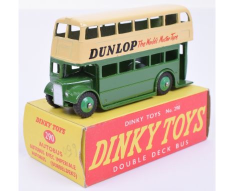 Dinky 290 Double Decker bus with plastic hubs, green lower deck, cream upper deck, ‘DUNLOP The World’s Master Tyre’ advert, g