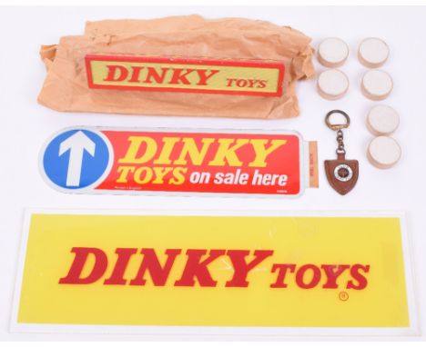 Dinky Toys Shop signs, Perspex ‘DINKY TOYS’ sign, red lettering on yellow background, 33x10.5cm (13x4 1/8”), ‘DINKY TOYS on s