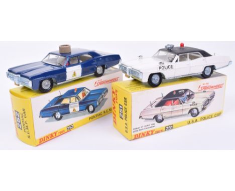 Dinky two North American Speedwheels Police cars, 251 Pontiac Parisienne, white body, textured black roof, aerials, siren and