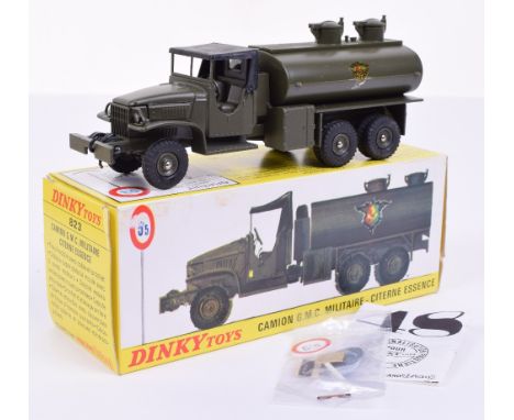 French Dinky 823 G.M.C Military Tanker, drab green body, black cab top, concave hubs,  mint condition, in yellow and white pi