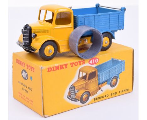 Dinky 410 Bedford End tipper, yellow cab and hubs, mid-blue back, mint condition, in yellow picture box with blue colour spot