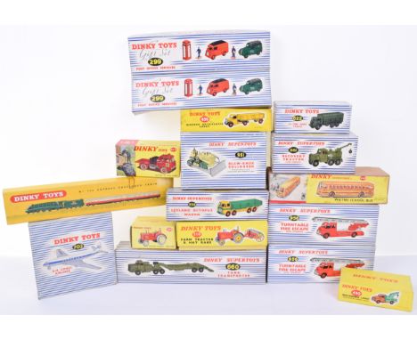 Dinky boxes and lids, 961 Blaw Knox Bulldozer, 702 Comet Airliner, 310 Farm tractor and Hay rake with inner packing, 300 Mass