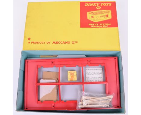 Dinky 758 Service Station kit, complete in un-made condition, windows with protective paper, support rods and screws in seale