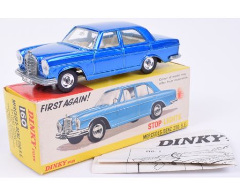 Dinky 160 Mercedes-Benz 250 S.E with Stop Lights, metallic blue body, white interior, spun hubs, mint condition, in yellow an