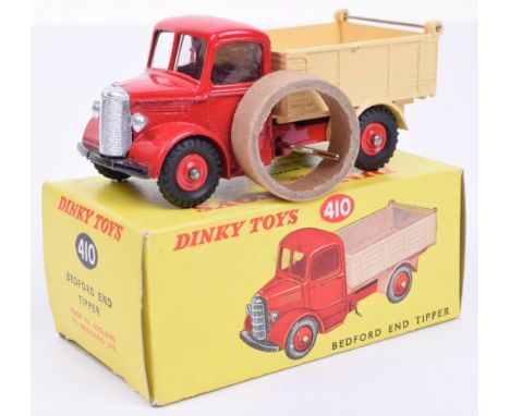 Dinky 410 Bedford End tipper with plastic hubs, red cab and red plastic hubs, cream back and window glazing, mint condition, 