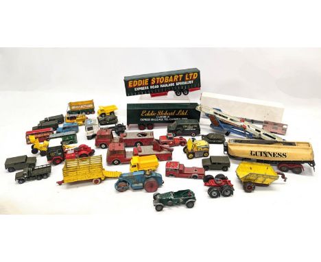 A collection of Corgi and other model cars, trucks, etc. 
