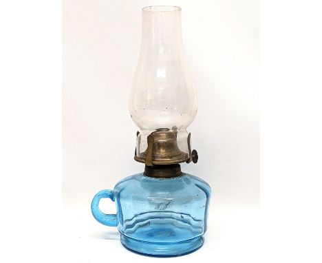 A Victorian glass finger oil lamp. 27cm 