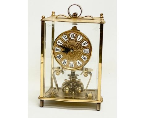 A vintage brass German mantle clock by Keninger &amp; Obergfell. 14x11x22cm. 