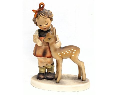 An M. I. Hummel West German pottery figure. 13.5cm 