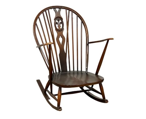 An Ercol Grandfather model 316 Mid Century Elm rocking chair. 