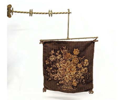 A Victorian ornate brass and tapestry wall hanging. 65x82cm 