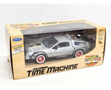 A Back To The Future Delorean Time Machine model toy car by Welly. Box measures 23x10cm 
