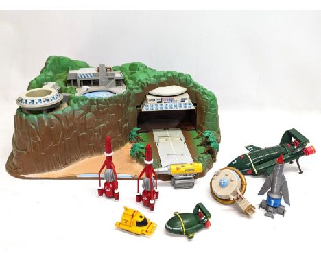 A vintage Thunderbirds model toy set with accessories, etc. 