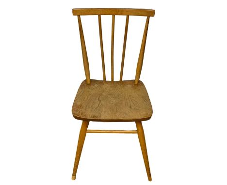 An Ercol Blonde Elm Model 391 Mid Century chair. 