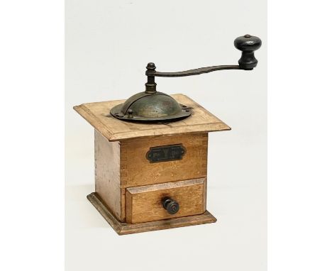 A vintage coffee grinder. 