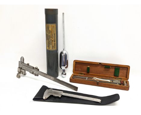 A quantity of vintage precision tools with a vintage Hydrometer. 
